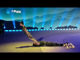 resting acrobatic power show performance "one fist all for one"